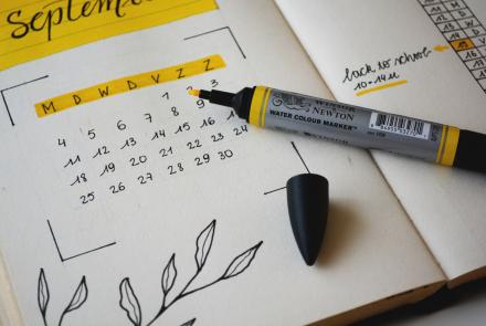 Calendar with yellow highlighter - monthly giving